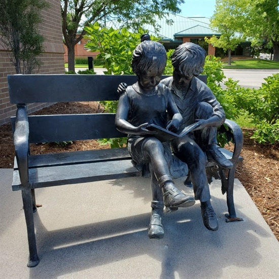 Children on a Bench Bronze Sculpture